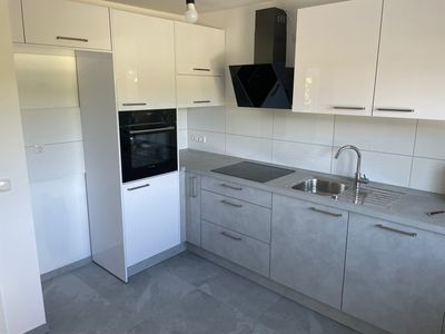 Große und helle Maisonettewohnung mit dir. Gartenzugang und Wintergarten