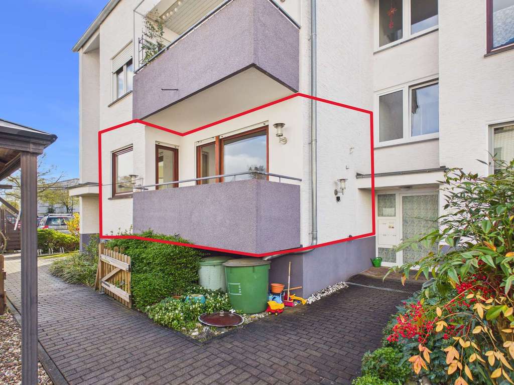 Immobilie in Bruchköbel - Großzügige Eigentumswohnung mit 2 Balkonen, Garage & Gartenanteil - Bild 0
