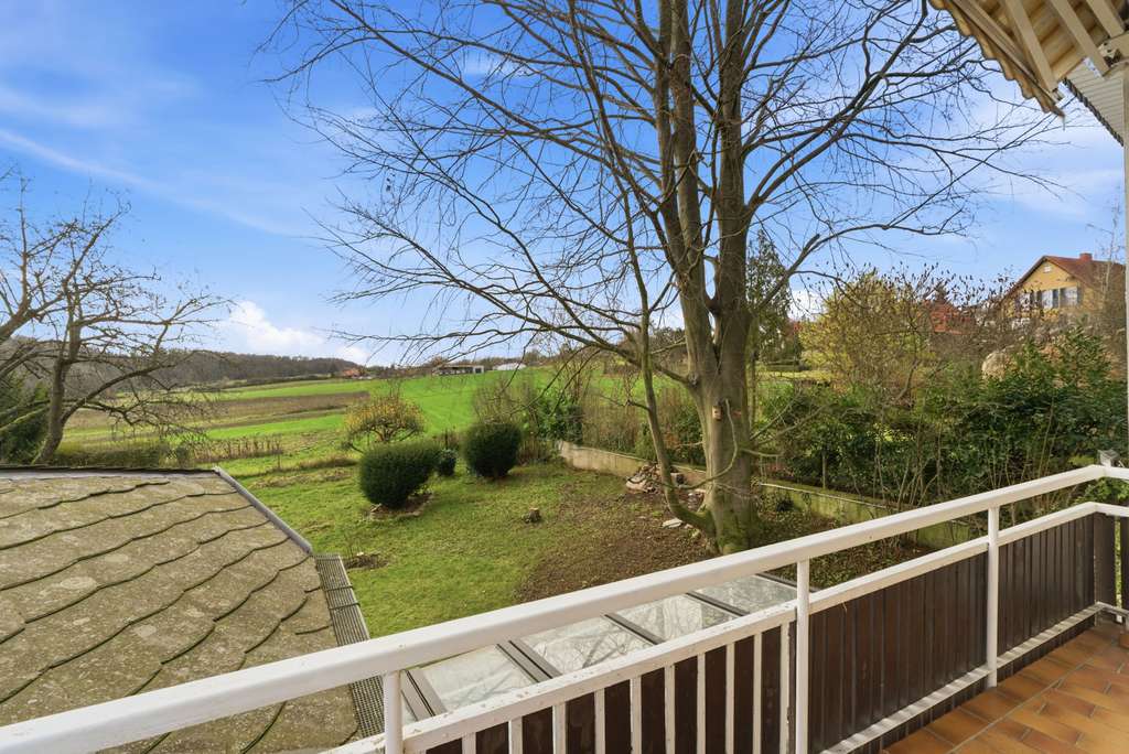 Immobilie in Bornheim - Viele Möglichkeiten! Großzügiges Split-Level-Einfamilienhaus mit großem Garten und Garage in Brenig - Bild 3