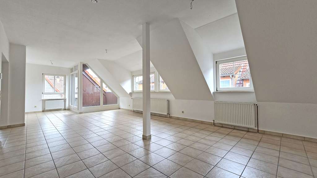 Immobilie in Rockenhausen - Attraktive Dachgeschosswohnung in direkter Innenstadtlage! - Bild 1