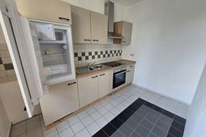 Vermietete gemütliche 2-Raum-Wohnung mit Balkon, offener Küche und Blick in den Innenhof