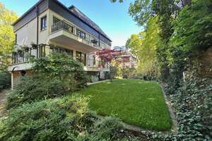 Wohnen an der Isar: 4-Zimmer-Wohnung mit großzügigem Garten in Bogenhausen