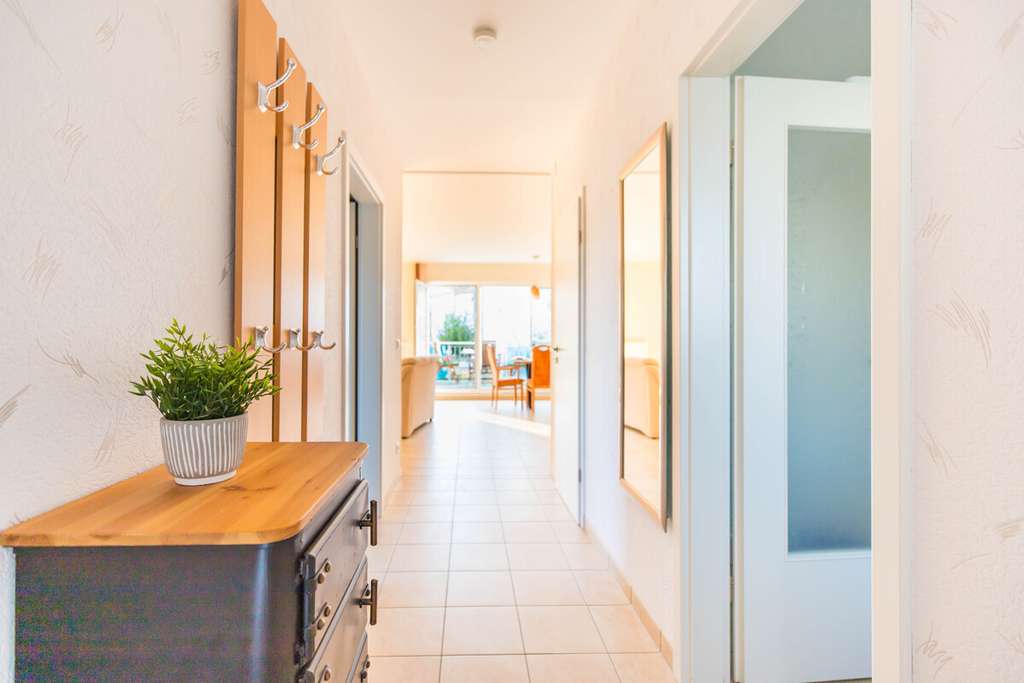 Immobilie in Breege - Nur ca. 170m zum Ostseestrand! Eigentums-/Ferienwohnung mit Terrasse & Tiefgarage in 18556 Juliusruh - Bild 1