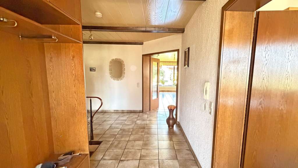 Immobilie in Hünxe - Bungalow mit großem Garten, Vollkeller und Garage in ruhiger Lage von Hünxe - Bild 2