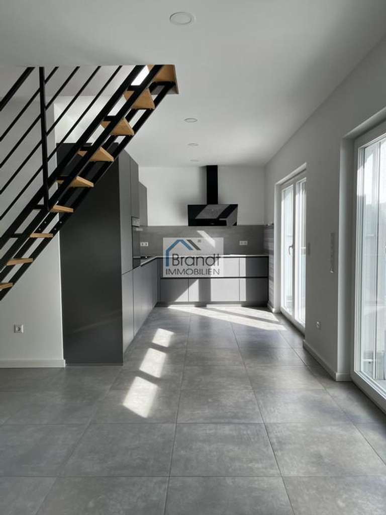 Immobilie in Rosdorf - Lichtdurchflutete 3-Zimmer-Wohnung, traumhafte Dachterrasse und niedrigen Energiekosten in Rosdorf! - Bild 3