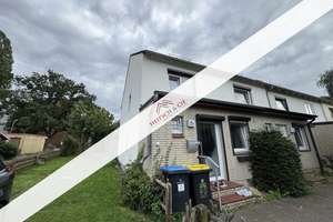 Charmantes vermietetes Reihenendhaus mit Terrasse und Entwicklungspotenzial in zentraler Lage!