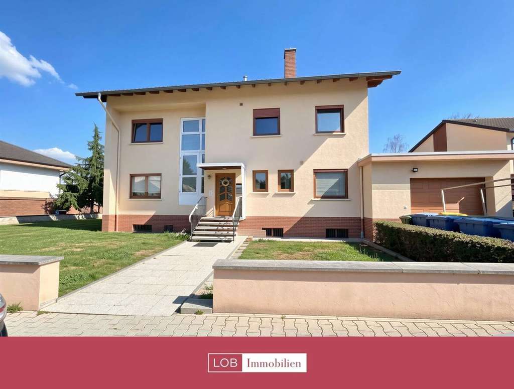 Immobilie in Gau-Bickelheim - Familienfreundlich & modern – Haus mit großem Sonnengarten - Bild 0