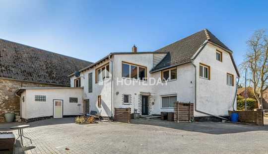 Bild von Vielseitiges Zweifamilienhaus mit großzügigem Grundstück und massivem Nebengebäude