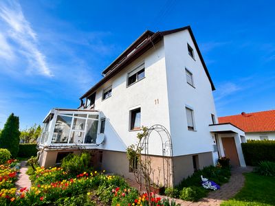 Freistehendes Ein- bis Zweifamilienhaus m. Wintergarten
u. schönem Gartenbereich in bevorz. Lage