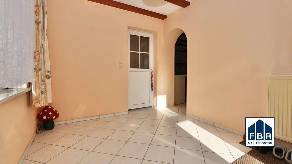 Immobilie in Lübz - Ihr bezahlbares Zuhause mit Wintergarten und Garage in Lübz - Bild 3