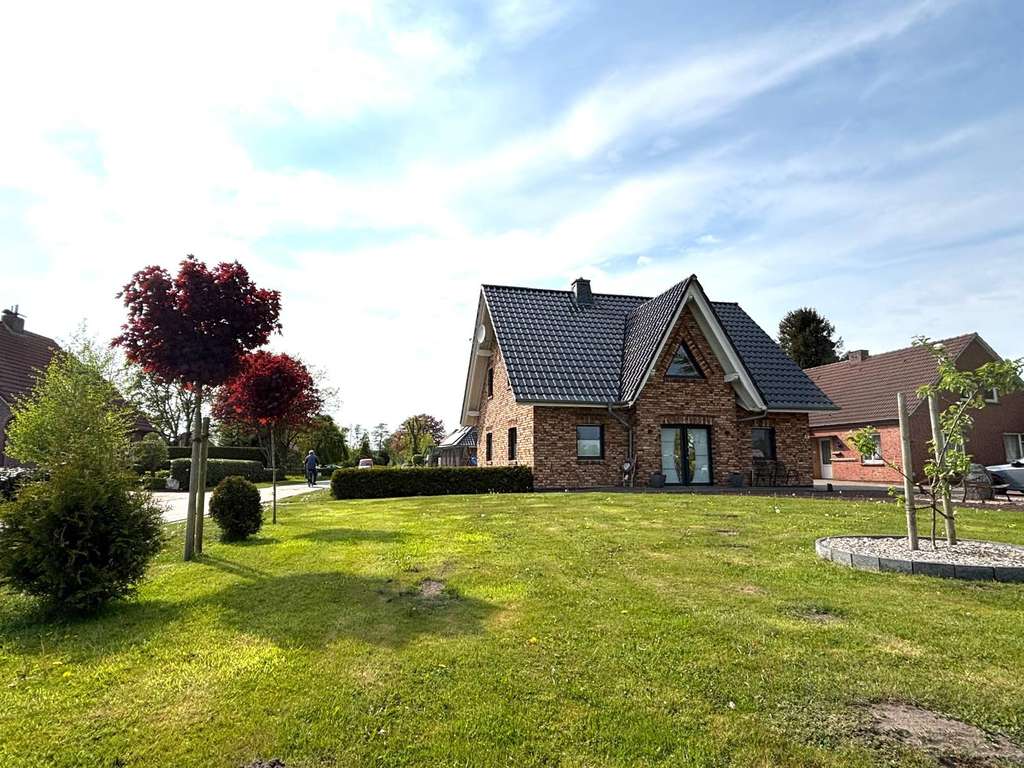 Immobilie in Großheide - Gepflegtes 3-Giebel-Haus auf großem Grundstück in Großheide - Bild 1