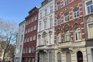 Denkmalgeschützes Mehrfamilienhaus in zentraler Lage