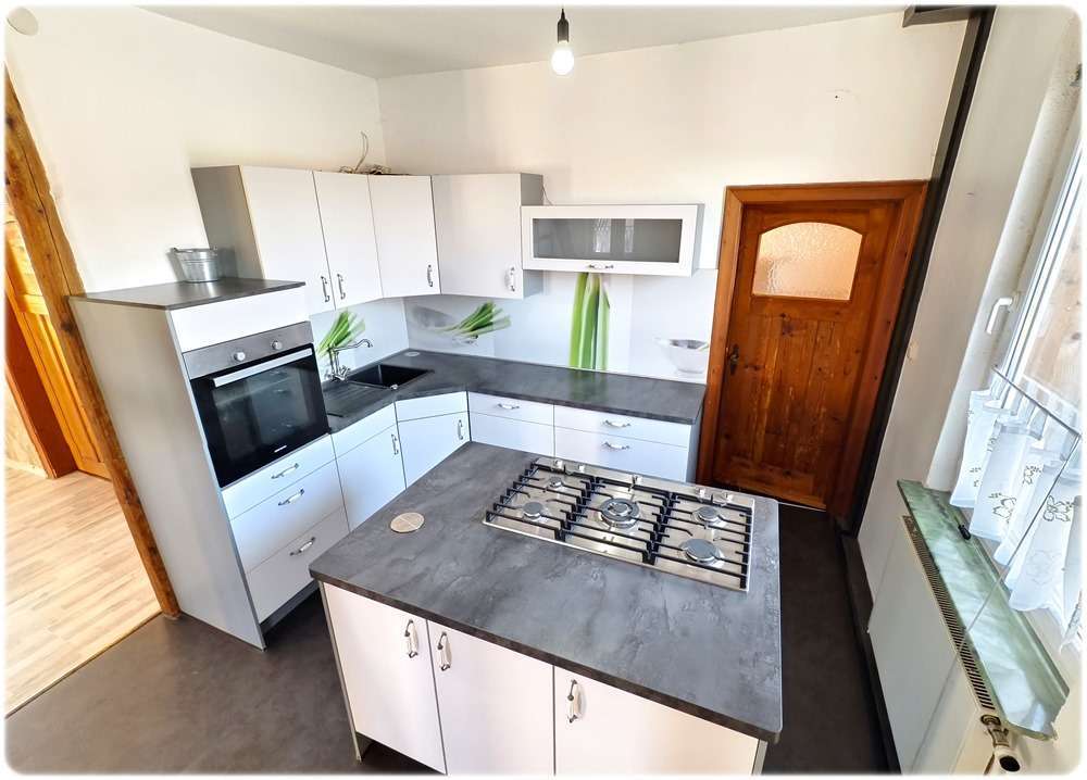 Immobilie in Lehrte - Lehrte-Röddensen: Perfekt für Familien – 2 Wohnungen auf 3 Etagen laden zum gemeinsamen Leben ein! - Bild 8