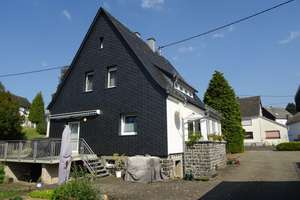 Attraktives Gesamtpaket: Einfamilienhaus und Wohn-/Geschäftshaus auf 1.226 m² Grundstück – Die vollständige Adresse der Immobilie erhältst du vom Anbieter., 56244 Rückeroth – Vorschaubild 4