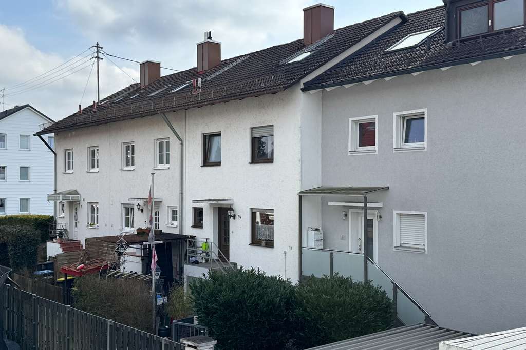 Immobilie in Karlsfeld - Vermietetes Reihenmittelhaus in ruhiger Lage von Karlsfeld - Bild 0