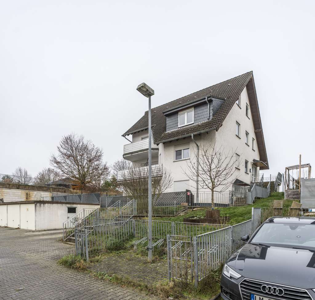 Immobilie in Hünfelden - NEU *Paul & Partner* INVESTMENTCHANCE: MEHRFAMILIENHAUS IN BELIEBTER UND RUHIGER WOHNLAGE! - Bild 2