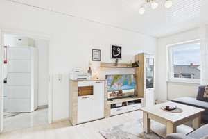 4 Zimmer Wohnung mit Balkon in gepflegtem Mehrfamilienhaus
