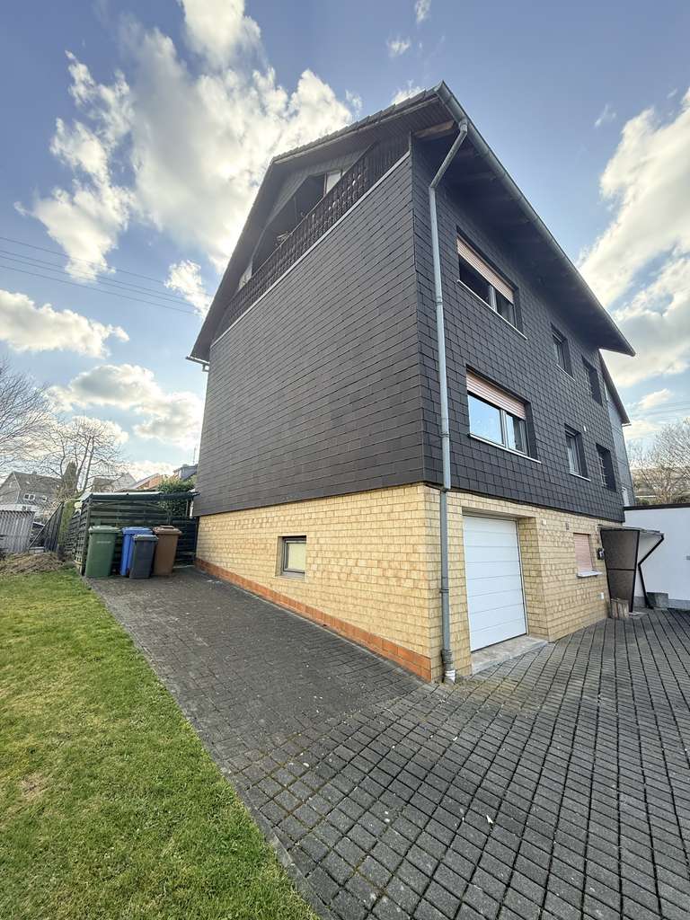 Immobilie in Wilnsdorf - Familienfreundliches Einfamilienhaus mit Garten und 3 Balkonen in Wilnsdorf - Bild 1