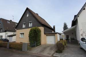 freistehendes Einfamilienhaus mit großem Garten und Garage in Köln-Dellbrück – Kräuterweg 24, 51069 Dellbrück, Köln – Vorschaubild 1