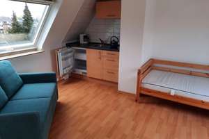 Helle teilmöblierte DG-Wohnung in Köln- Holweide