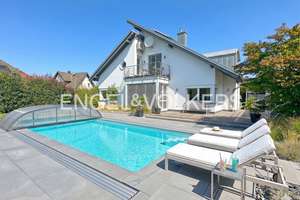 Familienidylle auf großzügigem Grundstück mit Pool, aufwendiger Gartengestaltung & PV-Anlage