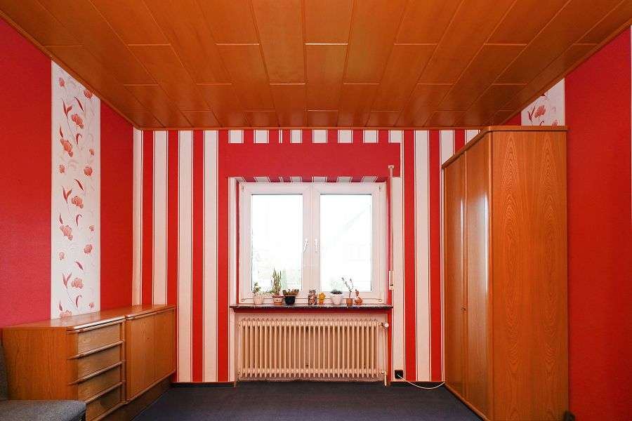 Immobilie in Melle - Attraktives Ein- bis Zweifamilienhaus auf schönem und erweiterbarem Grundstück in Melle! - Bild 1