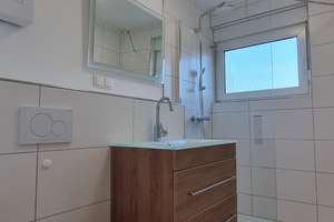Exklusive 4-Zimmer-EG-Wohnung mit Balkon und EBK in SB-Scheidt