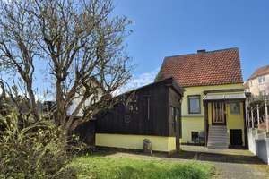 Freistehendes Einfamilienhaus mit sonnigem Traumgrundstück und Weitblick in Wiesbaden-Rambach