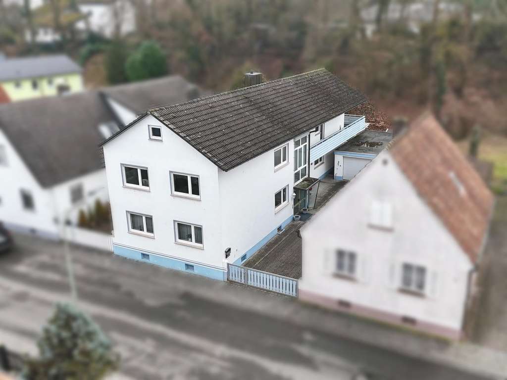 Immobilie in Wörth am Rhein - Bleiben Sie flexibel: Ein- oder Zweifamilienhaus in Top-Lage - Bild 0