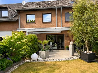 Viel Raum für die Familie – gepflegtes Reihenhaus mit schönem Garten und Garage in Monheim am Rhein