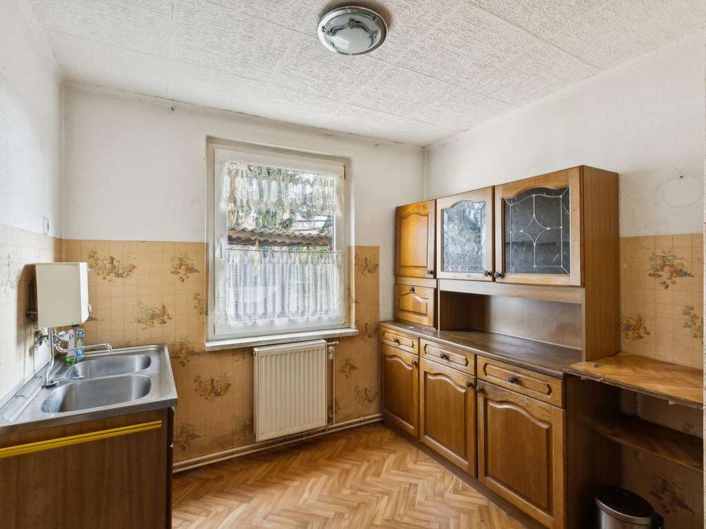 Immobilie in Leegebruch - Charmante Doppelhaushälfte in Leegebruch – Handwerkerobjekt mit Ausbaumöglichkeiten - Bild 4