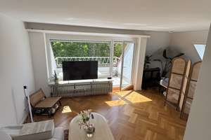 Lebendig wohnen in Neuhausen: 1,5-Zimmer-Dachgeschosswohnung mit Balkon