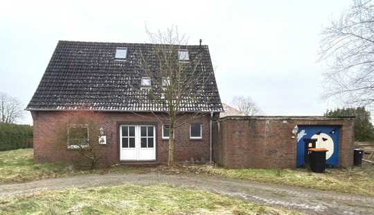 Bild von Zwangsversteigerung - Einfamilienhaus mit Garage in Burhafe