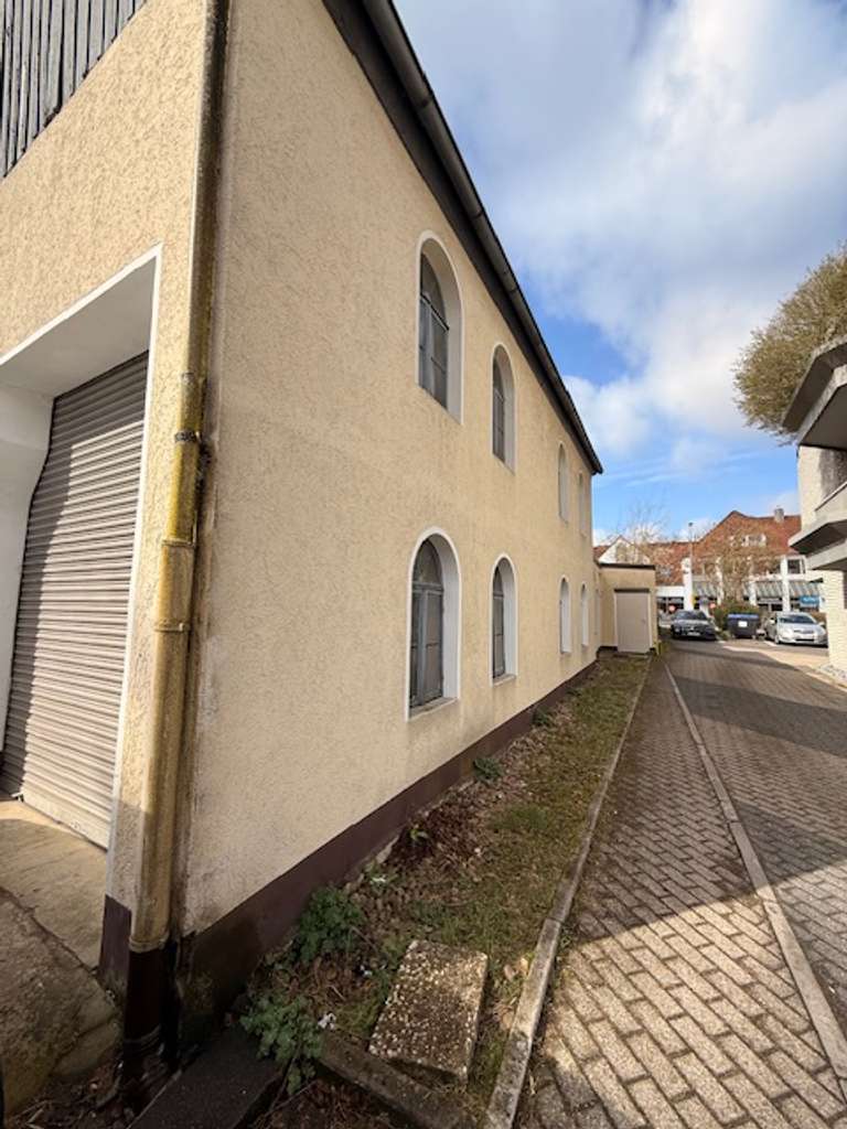 Immobilie in Bielefeld - Mehrfamilienhaus mit Zusatzchance: 4 Wohnungen vermietet + Lagerhalle - Ausbaureserve - Bild 1