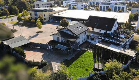 Bild von Doppelhaus mit ausgebautem Untergeschoss großer Garage und Garten! TOP für selbständige Hadwerker!