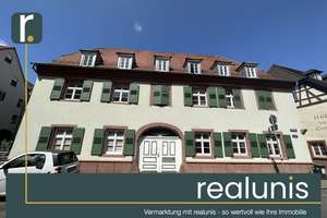 Charmante 1-Zimmer-Wohnung im denkmalgeschützten Altbau mit EBK und Stellplatz – nur bei realunis