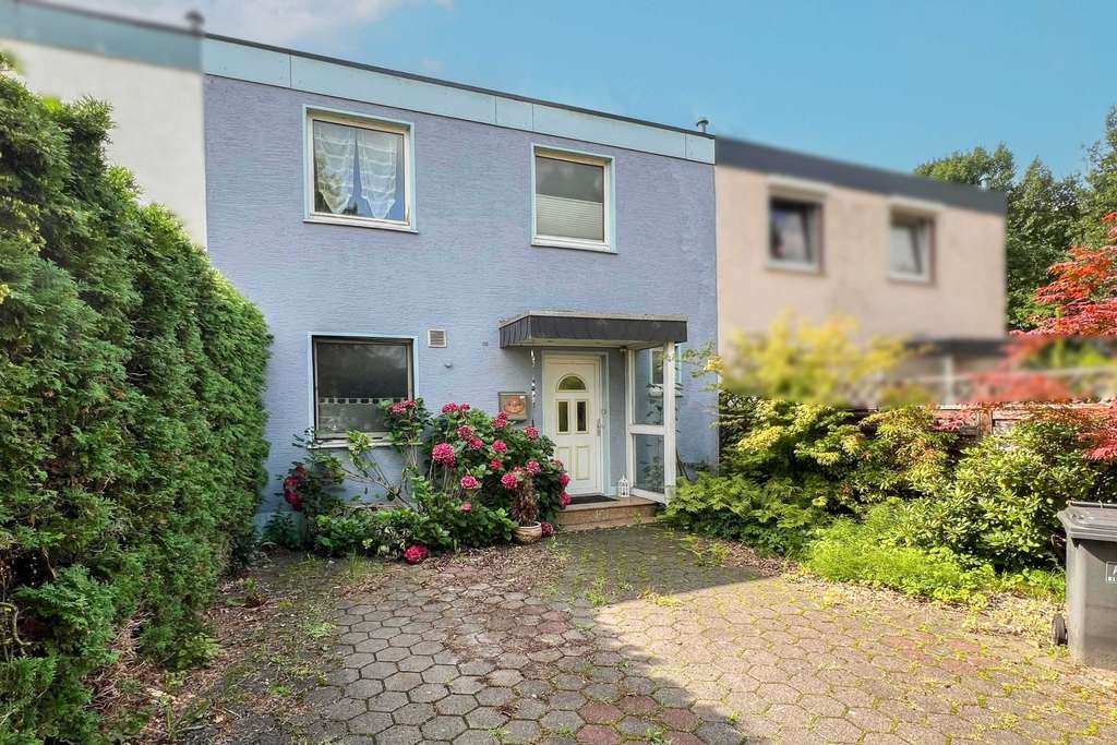 In ruhiger Vorstadtlage von Gütersloh: Reihenmittelhaus mit sonnigem Garten - Erbbaurecht