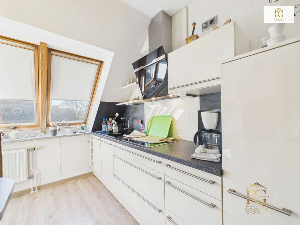 Immobilie in Neuenkirchen - Gepflegte Eigentumswohnung mit Terrasse und Gartenhaus in einem gepflegtem Mehrfamilienhaus in Neuen - Bild 2