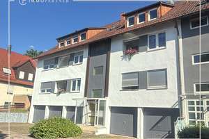 Familienfreundliche 3,5-Zimmer-Wohnung mit Einbauküche und großem Gartenabteil