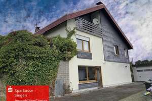 Großzügiges Einfamilienhaus mit Einliegerwohnung und Doppelgarage in Freudenberg-Oberholzklau  – Die vollständige Adresse der Immobilie erhältst du vom Anbieter., 57258 Freudenberg – Vorschaubild 1
