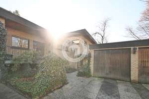 Ihr neues Zuhause: Großzügiger Splitlevel-Bungalow mit Einliegerwohnung in zentraler Lage