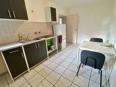 Zentral gelegene 1-Zimmer-Erdgeschosswohnung mit Balkon & Fußbodenheizung