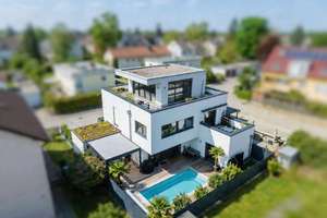 Design, Raum und Flexibilität – eine moderne Bauhausvilla mit Pool für alle Lebensphasen