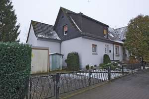 Reihenendhaus auf großem Grundstück mit Garage in Dortmund-Nette