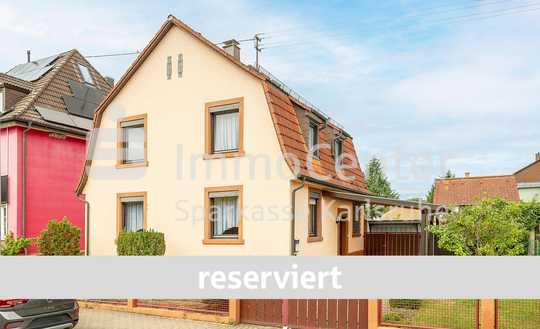 Familienfreundlich und charmant: Einfamilienhaus mit Wintergarten, Scheune und Garten in Neureut