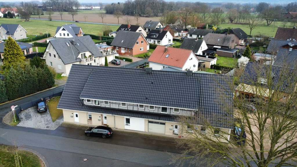 Immobilie in Espelkamp - Mehrfamilienhaus mit Rendite, Geschichte und moderner Technik – saniertes ehemaliges Schulgebäude - Bild 2