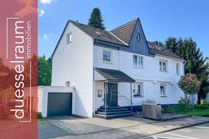 Unterrath: Top gepflegte Doppelhaushälfte mit Garten, Pool, Sauna & Garage