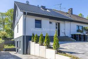 Modernisiertes Einfamilienhaus (einseitig angebaut) mit ELW, 2 Terrassen + Garten in Zentrumslage – Die vollständige Adresse der Immobilie erhältst du vom Anbieter., 53804 Much – Vorschaubild 1