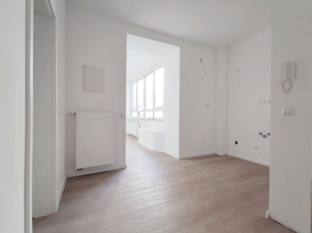 Immobilie in Osthofen - +Provisionsfrei+ Sanierte Eigentumswohnung im Erdgeschoss eines sieben Parteien Hauses in Osthofen - Bild 1