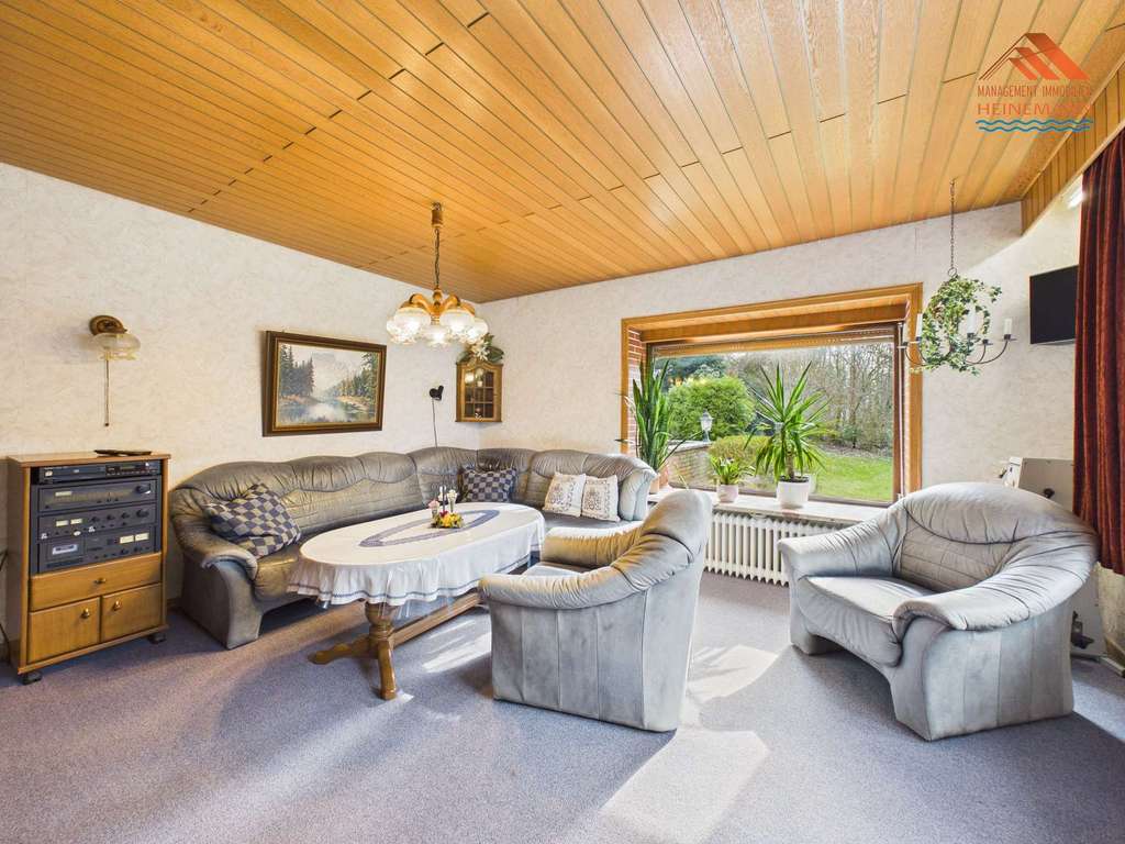 Immobilie in Neuenkirchen - Nostalgie trifft Potenzial: Freistehendes Einfamilienhaus auf großem Naturgrundstück in Neuenkirchen - Bild 4